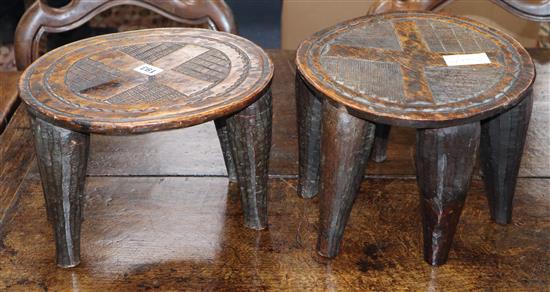Two carved African tribal stools height 21cm